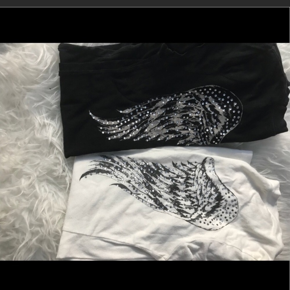 And Angel Slaes Her Wings Black
